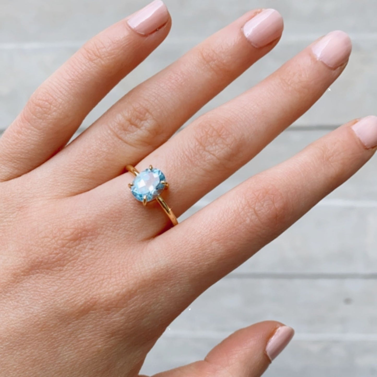 Pietra Ring with oval Blue Topaz