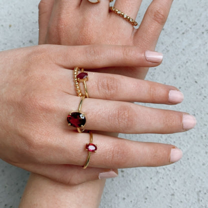 Pietra Ring with Rhodolite in oval cut